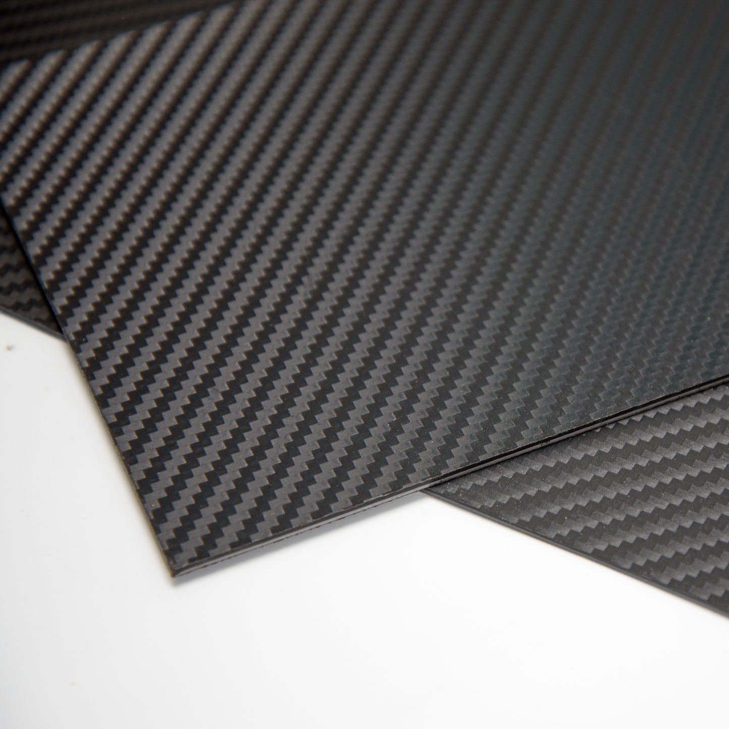 carbon-fiber-kydex-showing-texture-pattern-corner