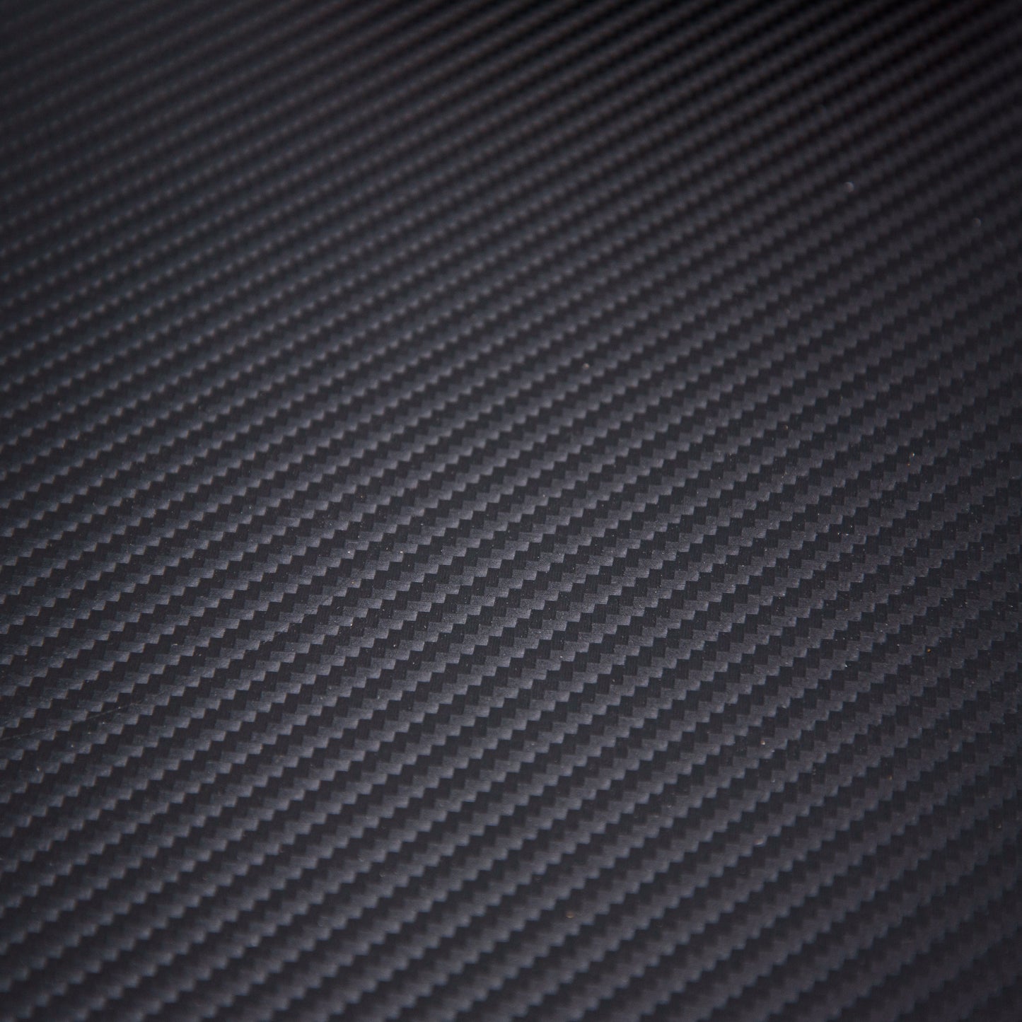 close-up-of-carbon-fiber-kydex-showing-texture