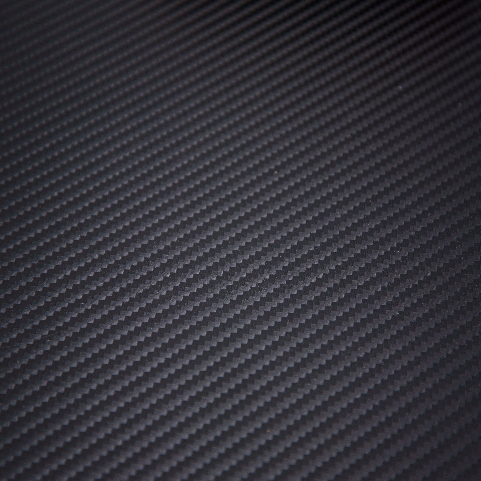 close-up-of-carbon-fiber-kydex-showing-texture