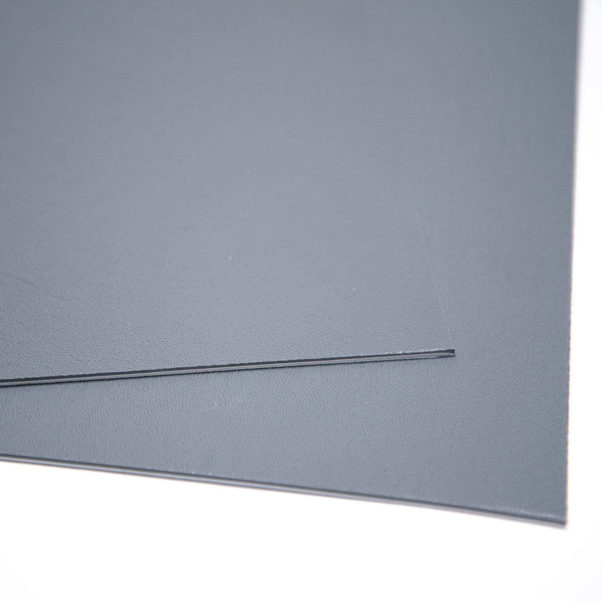 2-peices-of-grey-kydex-showing-corner=texture